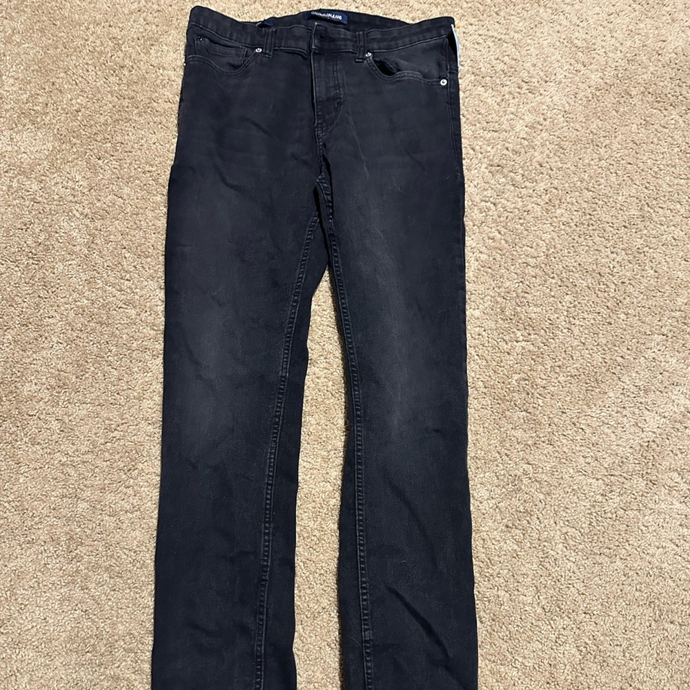 Black Calvin Klein jeans